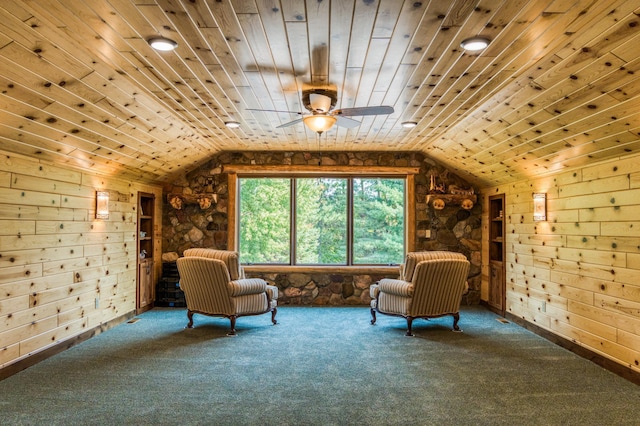 unfurnished room featuring wood ceiling, carpet flooring, and vaulted ceiling