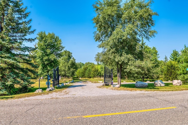 view of road with a gate