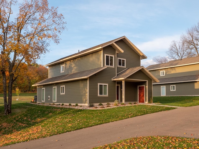 craftsman house with a front yard