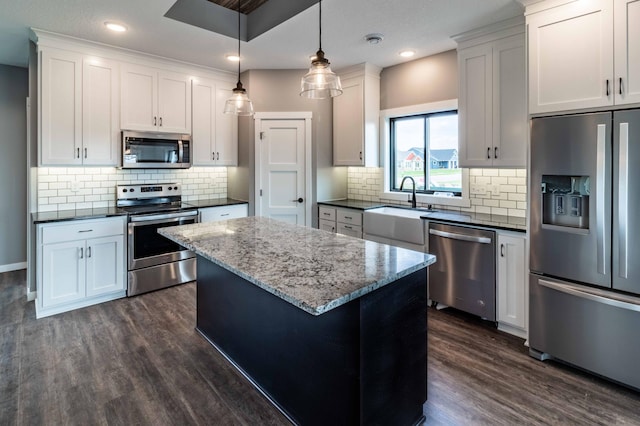 kitchen with decorative backsplash, stainless steel appliances, dark hardwood / wood-style flooring, and sink