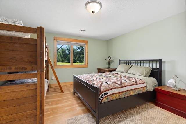 bedroom featuring light wood-type flooring