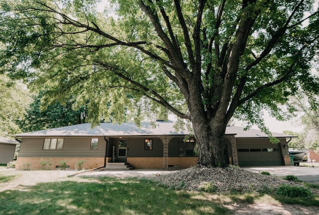 ranch-style house featuring a garage