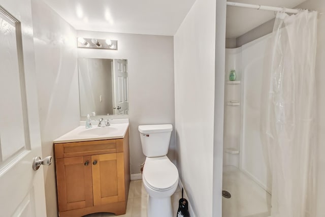 bathroom featuring vanity, toilet, tile patterned floors, and a shower with shower curtain