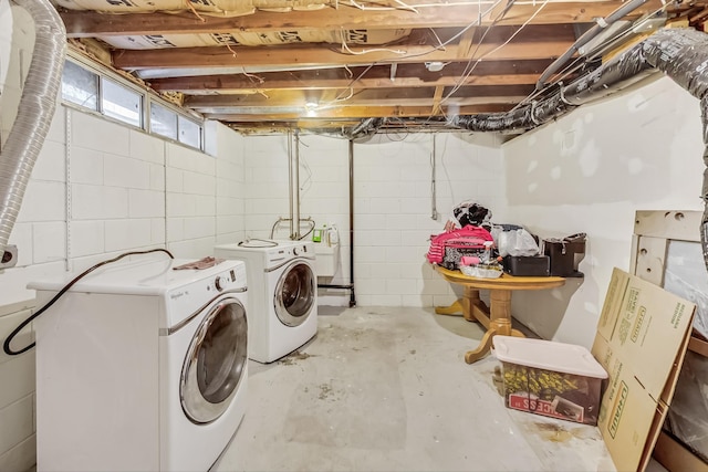 laundry room featuring washing machine and dryer