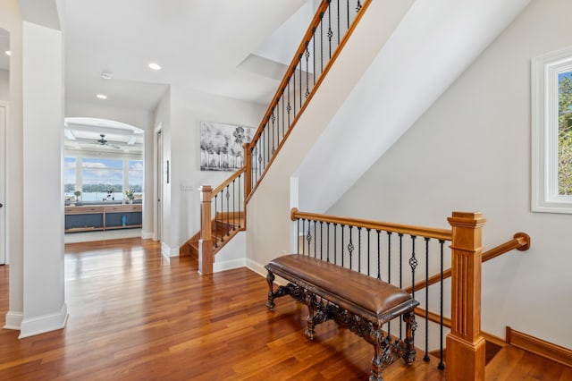 foyer entrance featuring baseboards, recessed lighting, a ceiling fan, and wood finished floors