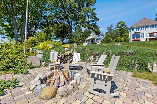 view of patio / terrace featuring a fire pit