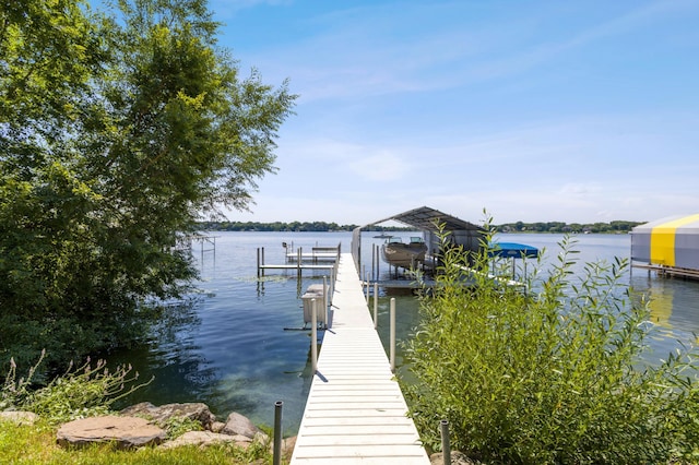 dock area featuring a water view