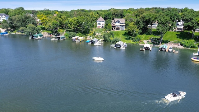birds eye view of property featuring a water view