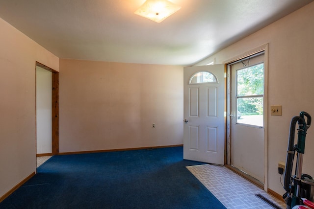 entrance foyer featuring carpet floors