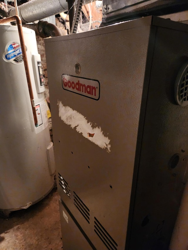 737 3rd Ave, Windom, MN 56101 - utility room with water heater and heating unit