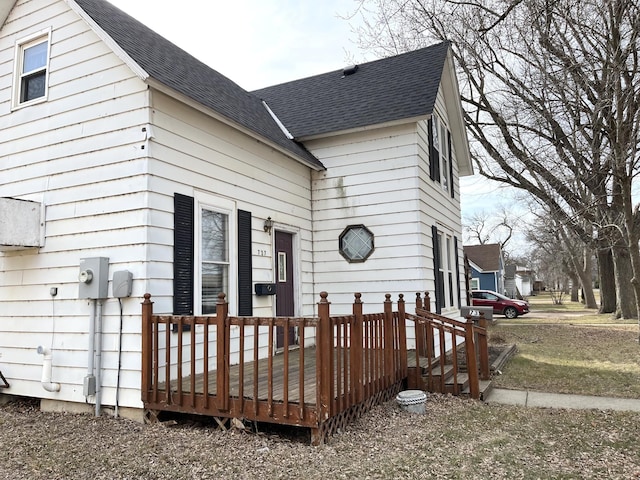 737 3rd Ave, Windom, MN 56101 - exterior space featuring a deck and a shingled roof