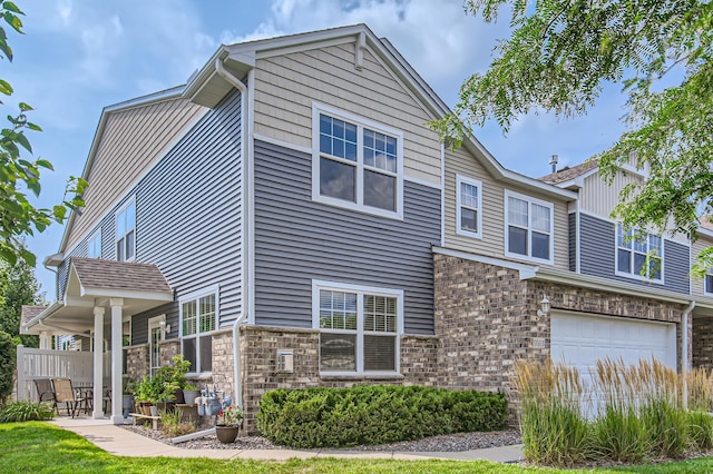 view of property exterior with a garage