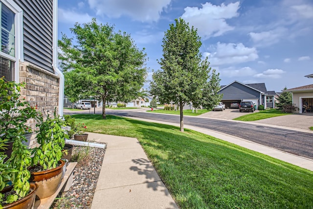 view of yard featuring a garage