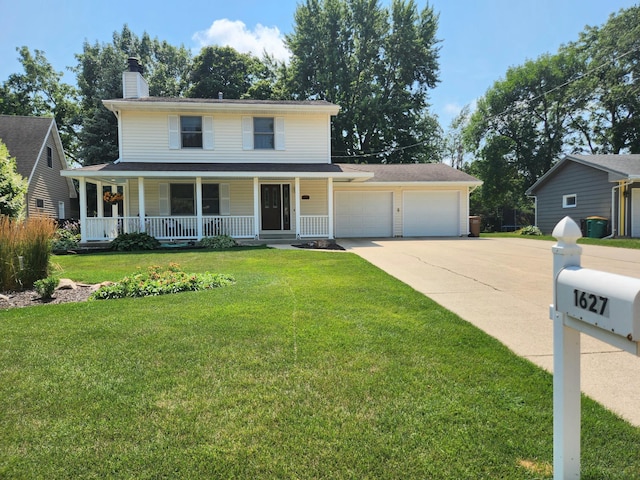 view of front of home featuring a porch, a garage, and a front lawn