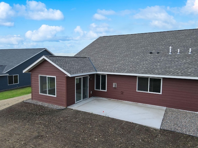 back of property featuring a patio