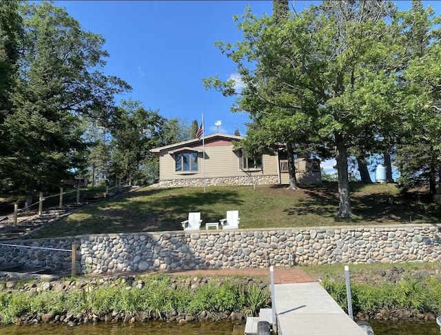 exterior space with a water view