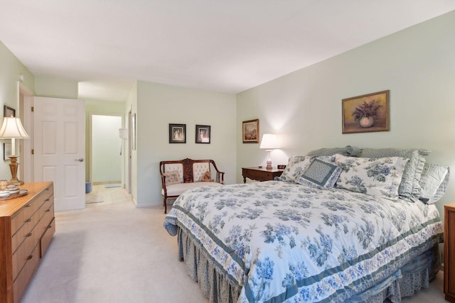 bedroom with light carpet