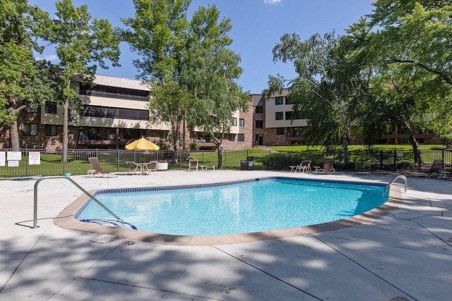 view of pool featuring a patio