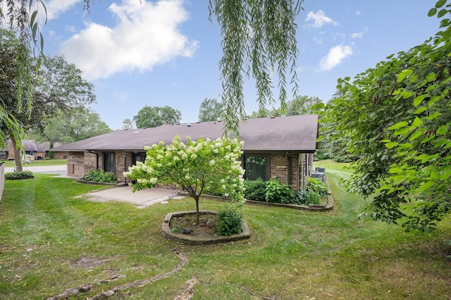 exterior space with a front yard