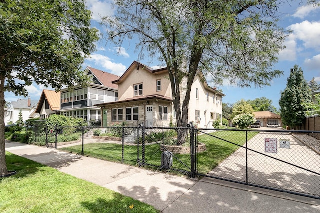 view of front of house with a front lawn