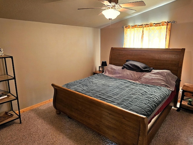 bedroom with ceiling fan and carpet floors