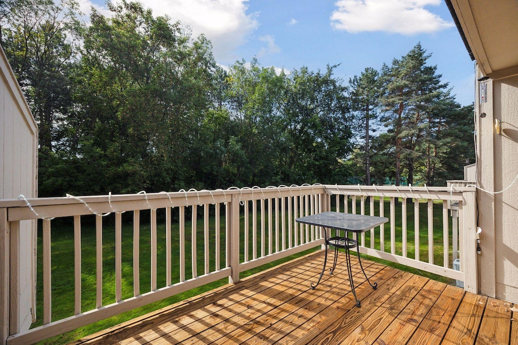 deck featuring a yard