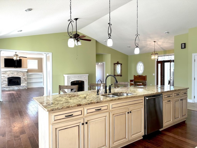 1225 Dorothy St, Isle, MN 56342 - kitchen featuring a stone fireplace, ceiling fan, a sink, open floor plan, and lofted ceiling