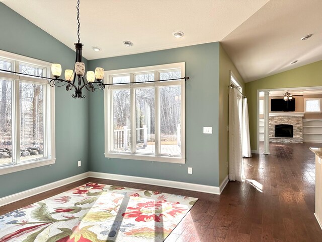 1225 Dorothy St, Isle, MN 56342 - unfurnished dining area featuring lofted ceiling, a chandelier, healthy amount of natural light, and dark wood-style floors