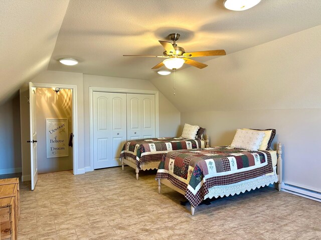 1225 Dorothy St, Isle, MN 56342 - bedroom with lofted ceiling, a closet, a baseboard radiator, and a ceiling fan