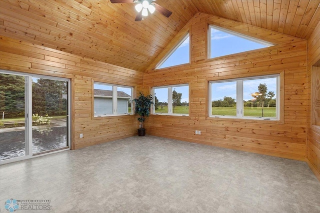 unfurnished sunroom with ceiling fan, vaulted ceiling, and wooden ceiling