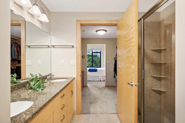 bathroom with vanity and walk in shower