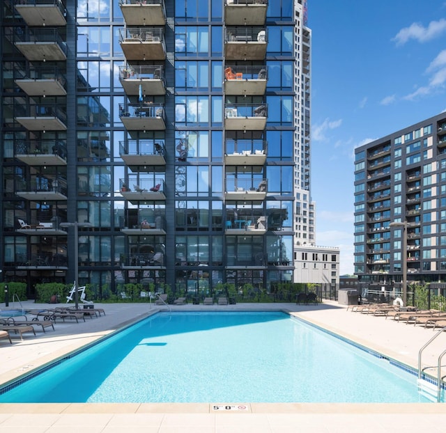 view of pool featuring a patio