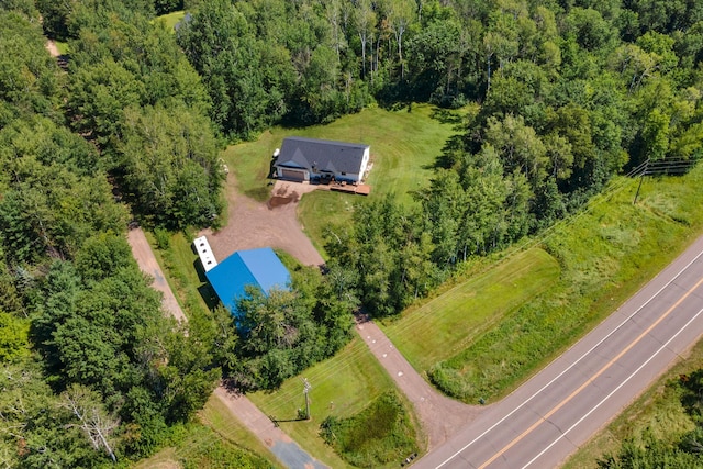 drone / aerial view with a forest view