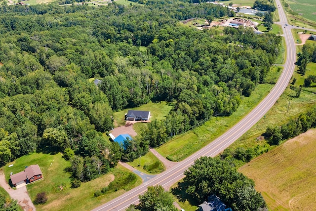 bird's eye view featuring a forest view
