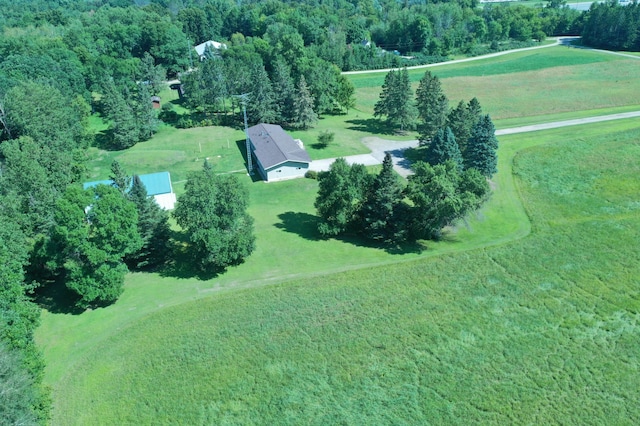 birds eye view of property featuring a rural view