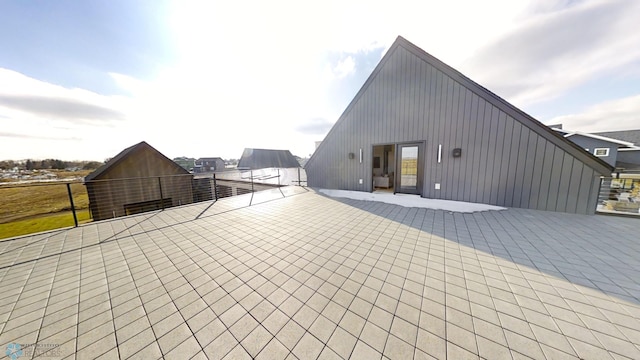 back of house featuring a patio