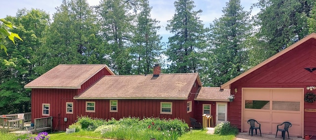 exterior space with a garage