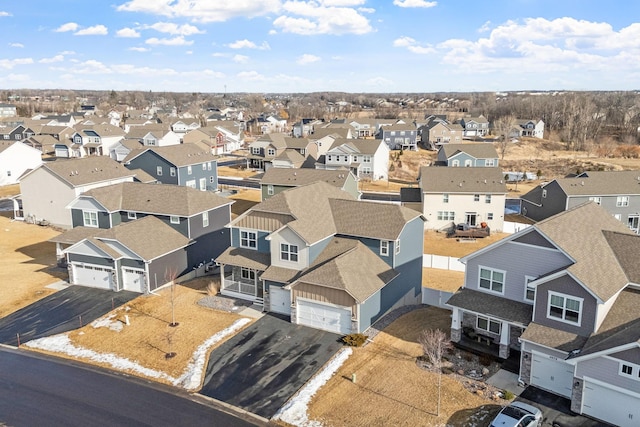 drone / aerial view with a residential view