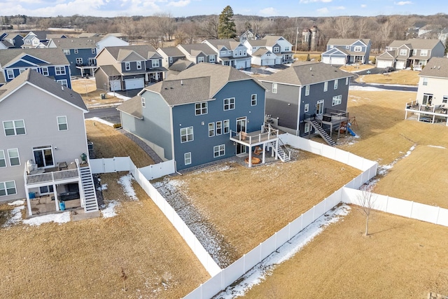 birds eye view of property with a residential view