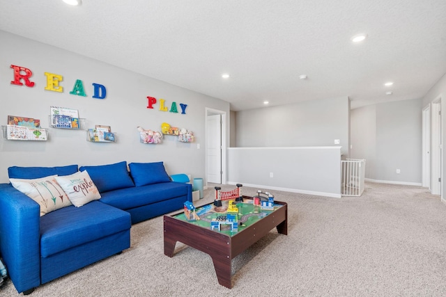 playroom with carpet floors, recessed lighting, a textured ceiling, and baseboards