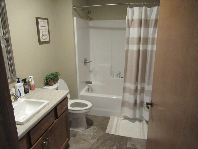 full bathroom with vanity, toilet, tile patterned floors, and shower / bath combo with shower curtain