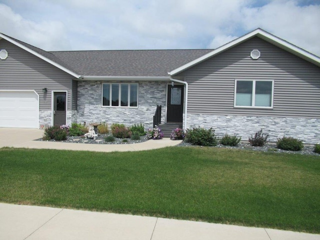 ranch-style home featuring stone siding, an attached garage, a shingled roof, a front lawn, and driveway