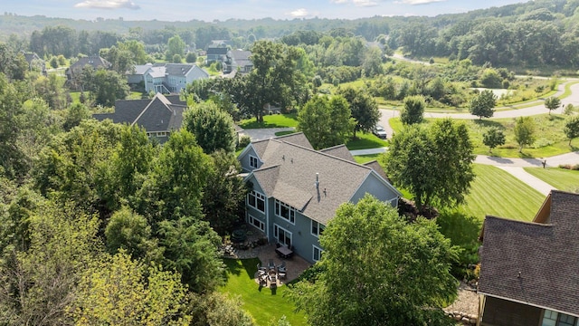 birds eye view of property with a residential view