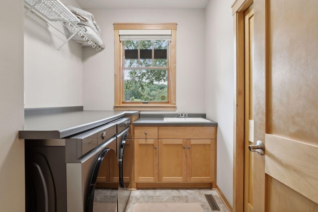 interior space with a sink and visible vents