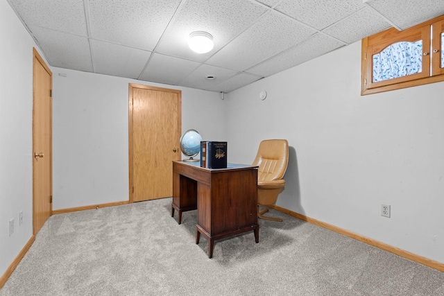 office area featuring carpet floors and a paneled ceiling