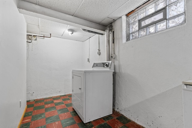 clothes washing area with washer / clothes dryer