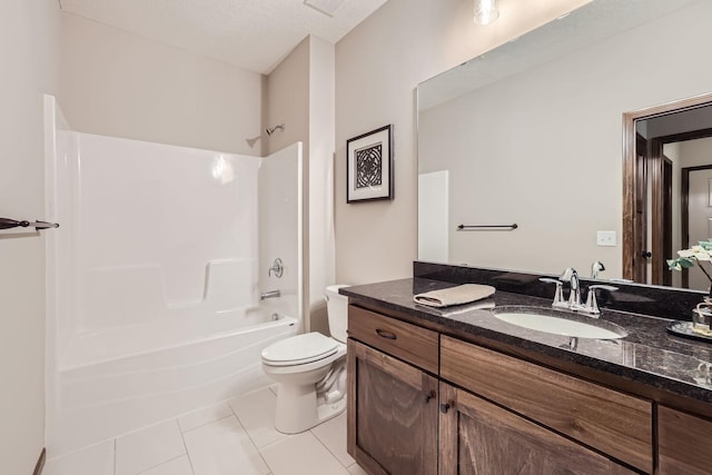 bathroom with vanity, toilet, washtub / shower combination, and tile patterned flooring