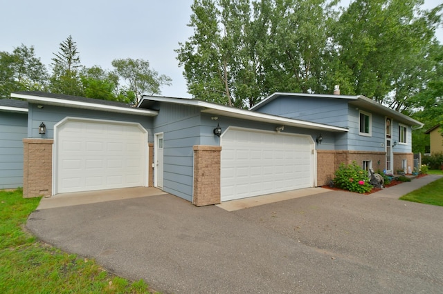 split level home with a garage