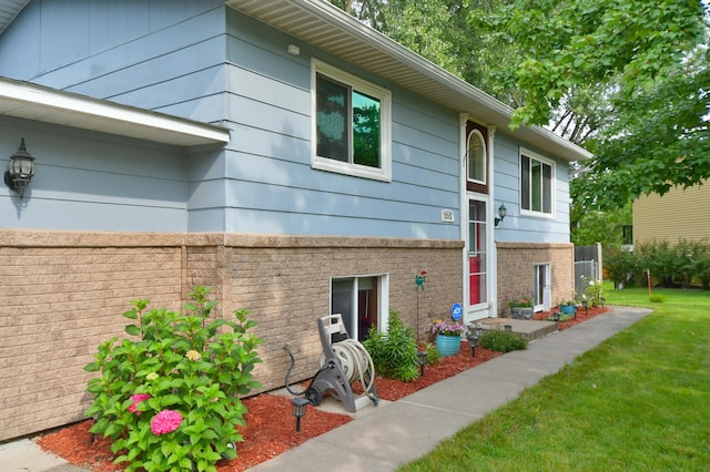 exterior space with a yard