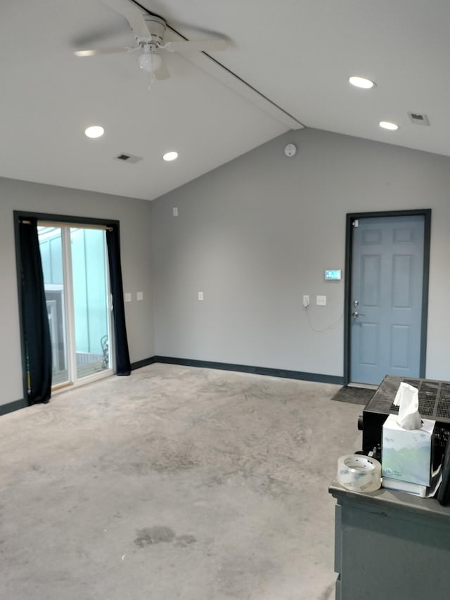 unfurnished living room with ceiling fan and lofted ceiling